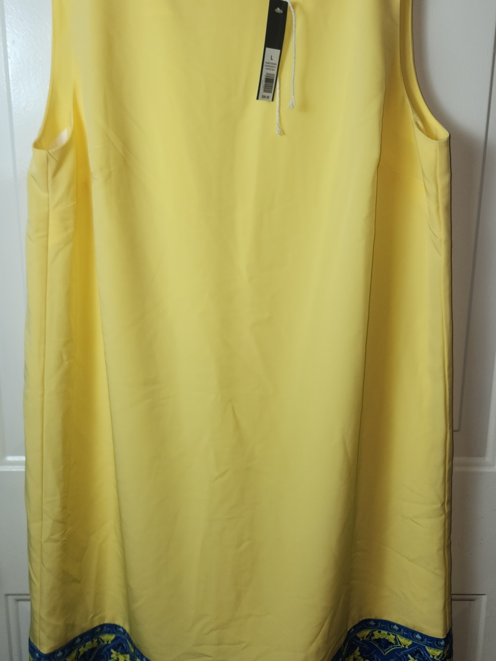 Yellow Sleeveless Shift Dress with Decorative Hem